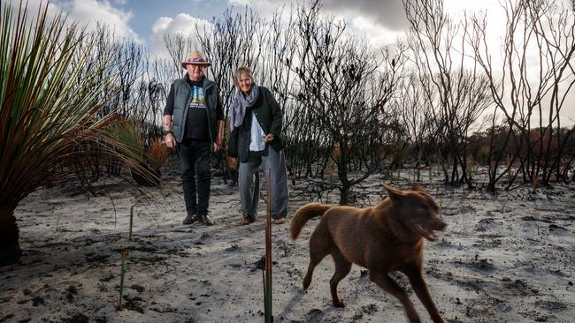 Fraser and Mia Vickery at their fire-ravaged bush heritage property in Vivonne Bay, Kangaroo Island. Picture: Matt Turner