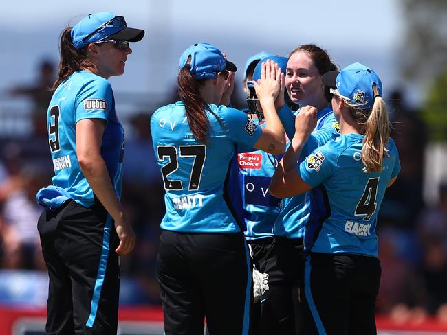 MACKAY, AUSTRALIA - NOVEMBER 14: Amanda-Jade Wellington of the Strikers celebrates after dismissing Georgia Redmayne of the Heat during the Women's Big Bash League match between the Brisbane Heat and the Adelaide Strikers at Great Barrier Reef Arena, on November 14, 2021, in Mackay, Australia. (Photo by Chris Hyde/Getty Images)