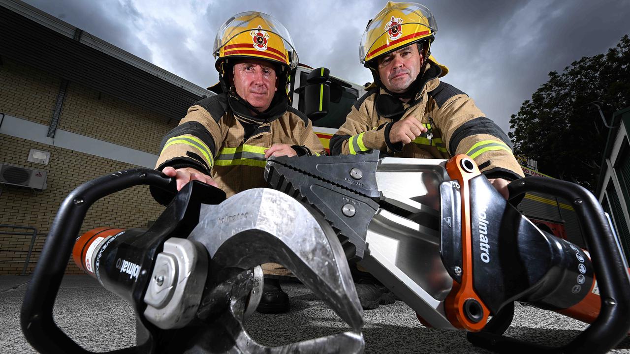 Station officers Alex Pearl and Matthew Skewes with hydraulic cutting equipment at the Annerley Fire and Rescue Station. Picture: Lyndon Mechielsen/Courier Mail