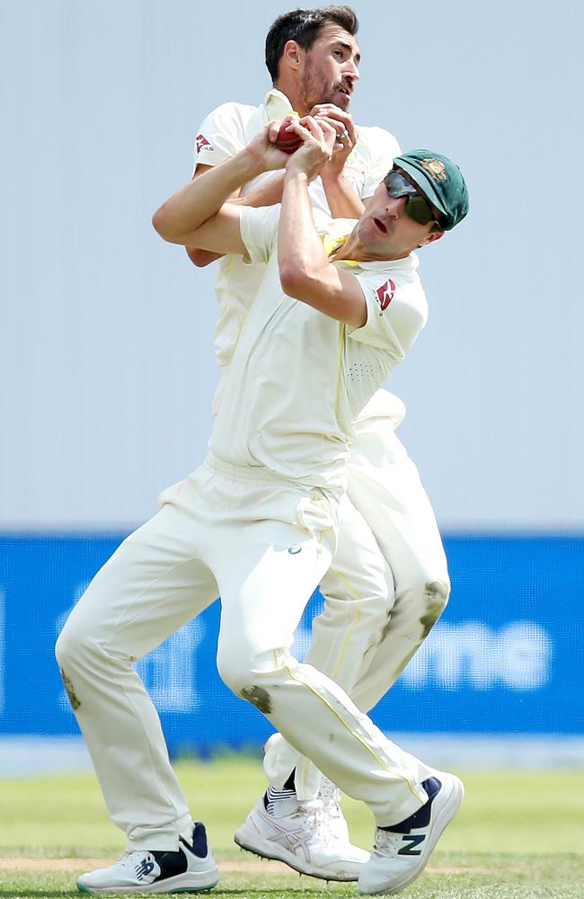 Pat Cummins collides with Mitchell Starc as he catches out Harry Brook during the third Ashes Test at Headingley. Picture: Ashley Allen/Getty Images