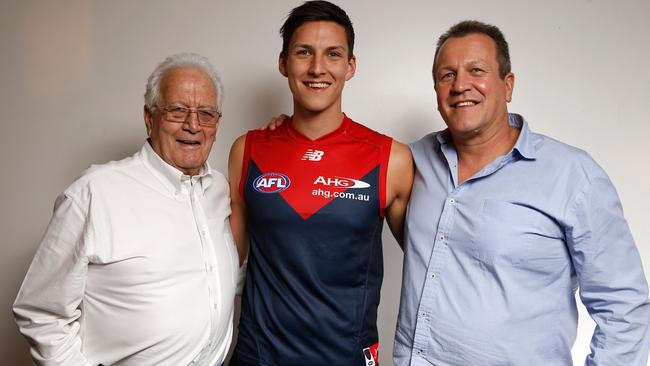 Murray Weideman poses for a photograph with son Mark and grandson Sam Weideman. Sam previously played with Melbourne but is now an Essendon player. Picture: Michael Willson/AFL Media.