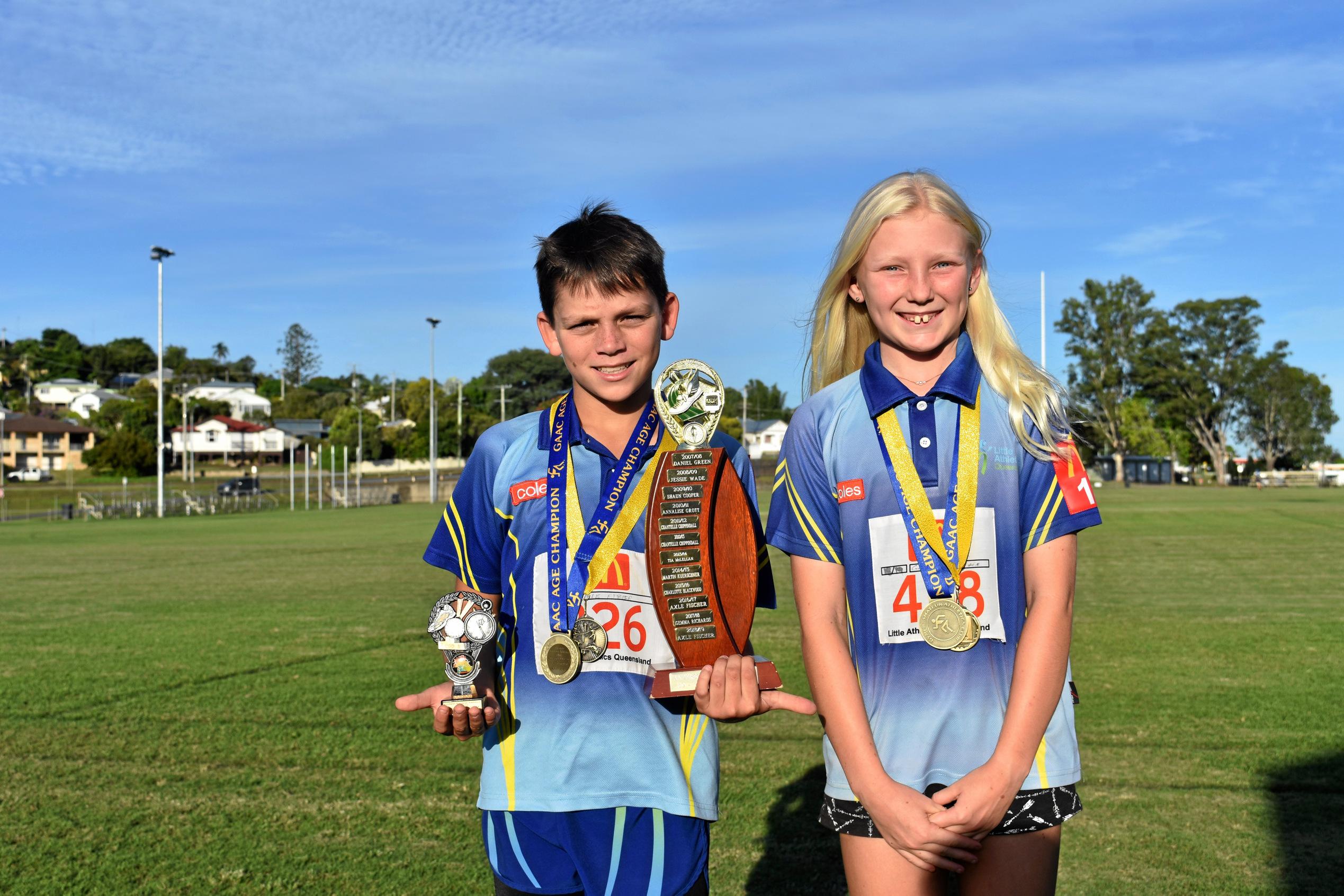 Athletics - Under 11 boys age champion and Anderson Family Shield under 9 - under 10 winner Axel Fischer and under 11 girls age champion winner Georgina McCabe. Picture: Bec Singh