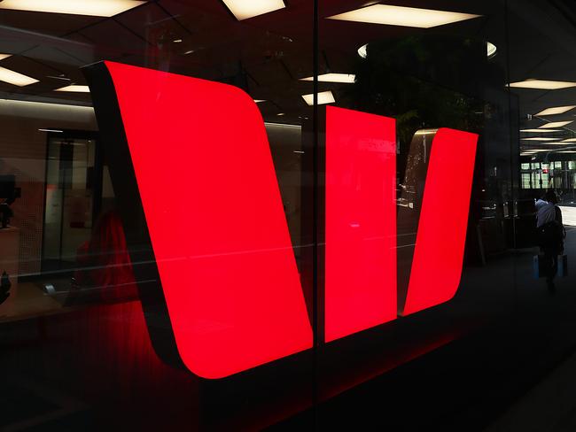 SYDNEY, AUSTRALIA - NOVEMBER 26: Pedestrians walk past a Westpac bank on November 26, 2019 in Sydney, Australia. Westpac has announced that chief executive Brian Hartzer will step down and chairman Lindsay Maxsted will leave the board early following the launch of an investigation by Australia's financial intelligence agency - AUSTRAC - over a money laundering and child exploitation scandal. AUSTRAC alleges the bank breached anti-money laundering laws 23 million times, including failing to adequately vet thousands of payments potentially linked to child exploitation. (Photo by Mark Metcalfe/Getty Images)