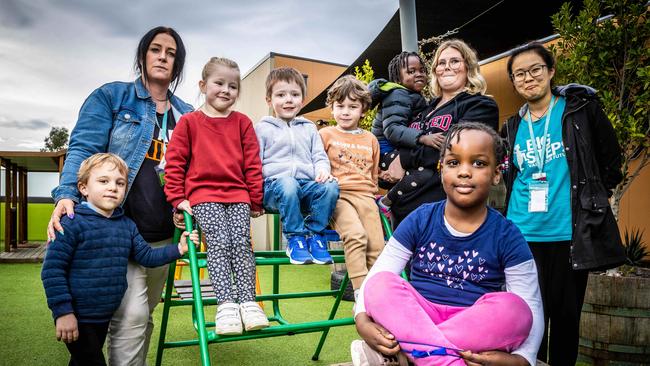 Cardinia Lakes Childcare staff Brooke McCoull, Carly Oldfield and Dee Pintar with some of the centre’s pupils. Picture: Jake Nowakowski