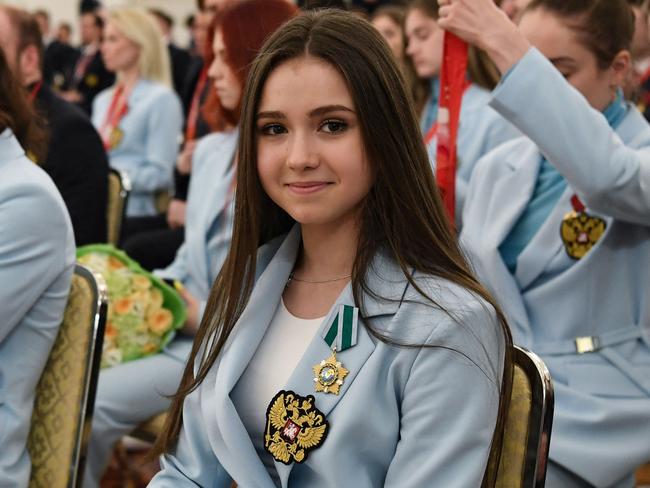 Russian figure skater Kamila Valieva attends a meeting of Russian President Vladimir Putin with Russia's medal-winning athletes of the Beijing 2022 Winter Olympic Games and members of the country's Paralympic team at the Kremlin in Moscow on April 26, 2022. (Photo by Natalia KOLESNIKOVA / AFP)