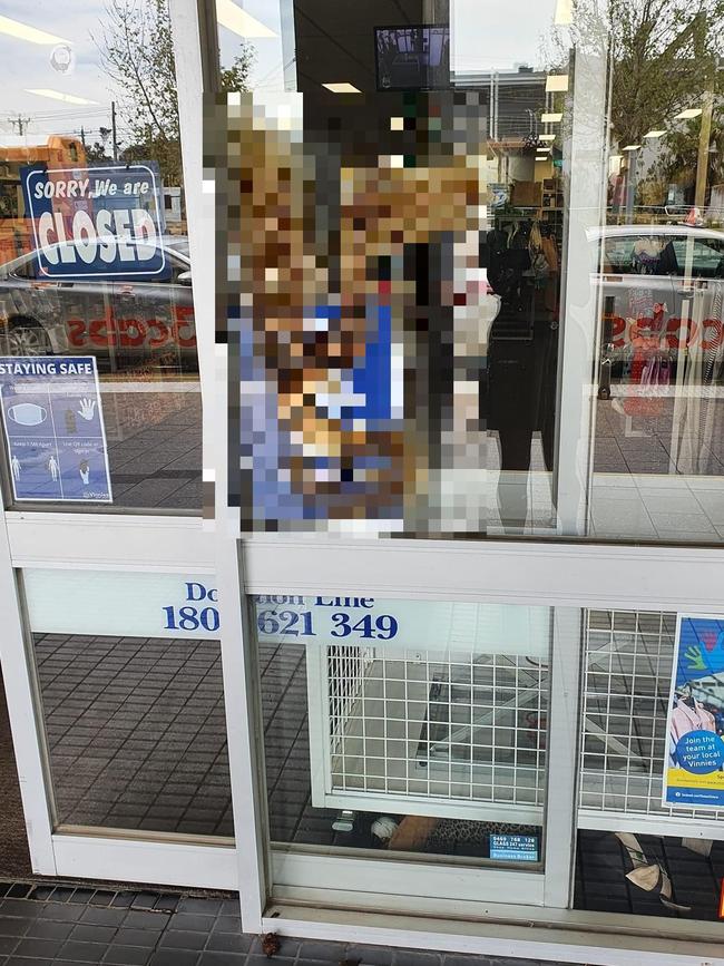 Human faeces smeared on a window at Frankston Vinnies.