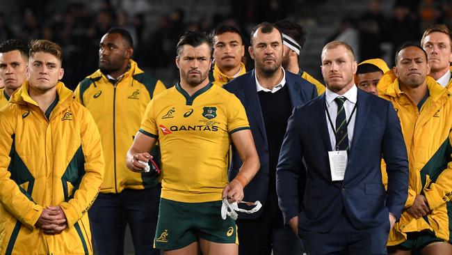 Coach Micheael Cheika with the Wallabies players after the defeat. Picture: AAP