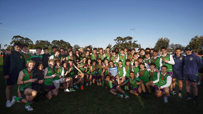 Parade College seniors and intermediate players pose for a photograph after winning the 2023 Herald Sun Shield boys grand finals. Picture: Daniel Pockett/AFL Photos/via Getty Images