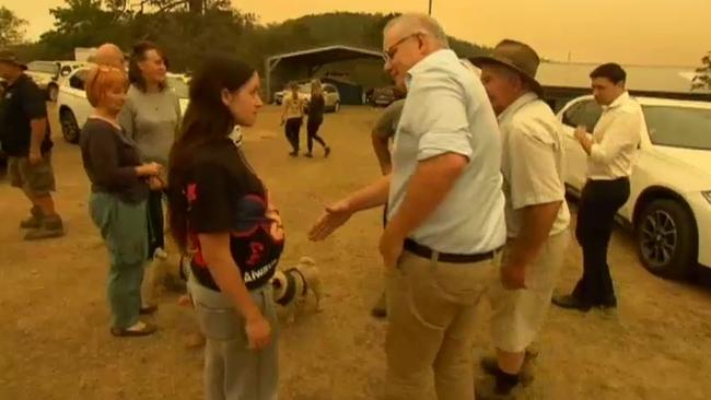 A woman refuses to shake Scott Morrison’s hand in Cobargo. Picture: Supplied