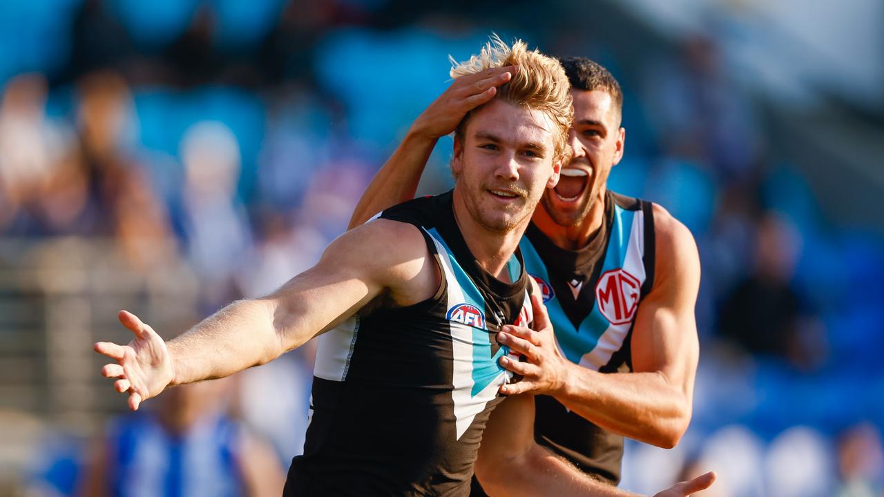 Jason Horne-Francis celebrates a goal against his former side. Picture: Dylan Burns/AFL Photos via Getty Images