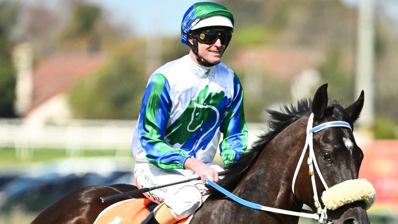 MELBOURNE, AUSTRALIA - SEPTEMBER 23: Luke Nolen riding I Wish I Win gallops in between races during Melbourne Racing at Caulfield Racecourse on September 23, 2023 in Melbourne, Australia. (Photo by Vince Caligiuri/Getty Images)