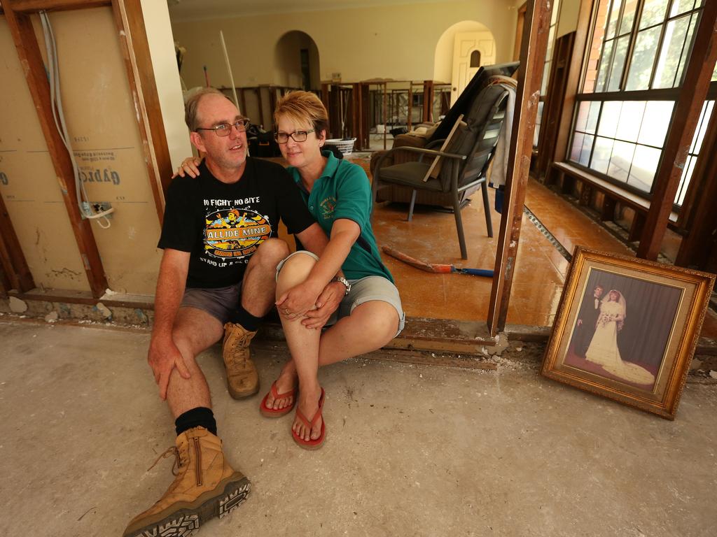 Robert and Margaret Fisher sit in their flood ruined home after the nearby Calide dam released huge quantities of water after cyclone Marcia two weeks ago in Biloela, west of Gladstone, Central QLD.