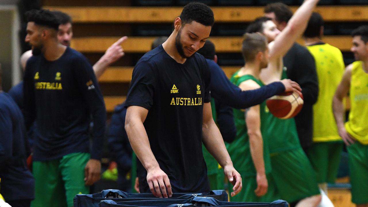 Ben Simmons (centre) of the Philadelphia 76ers is seen during the Australian Boomers squad training session at Melbourne Sports and Aquatic Centre in Melbourne, Saturday, August 3, 2019. Members of the 18-man Boomers World Cup Squad have touched down in Melbourne for the beginning of a six-day training camp. (AAP Image/James Ross) NO ARCHIVING