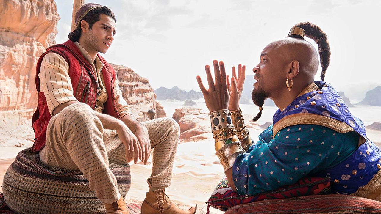 Mena Massoud and Will Sмith in Aladdin.