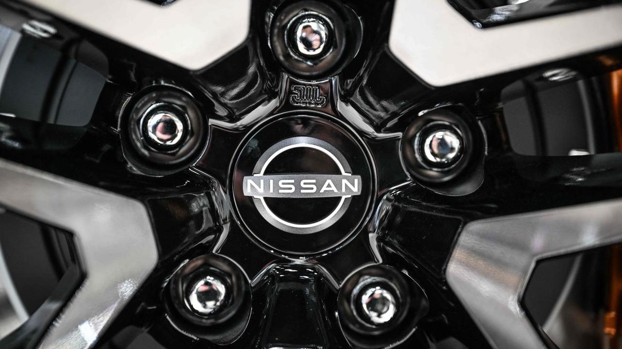 (FILES) The emblem of Japanese automaker Nissan Motor is seen at a showroom in Yokohama on May 9, 2024. (Photo by Yuichi YAMAZAKI / AFP)