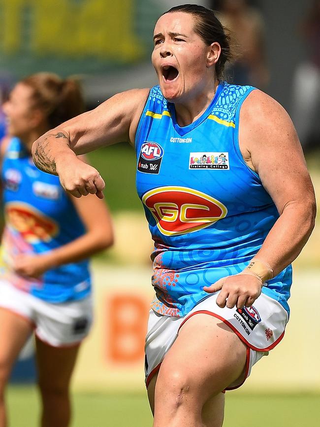 Fan favourite Sarah Perkins celebrates kicking a goal in Suns’ colours. Picture: Getty Images