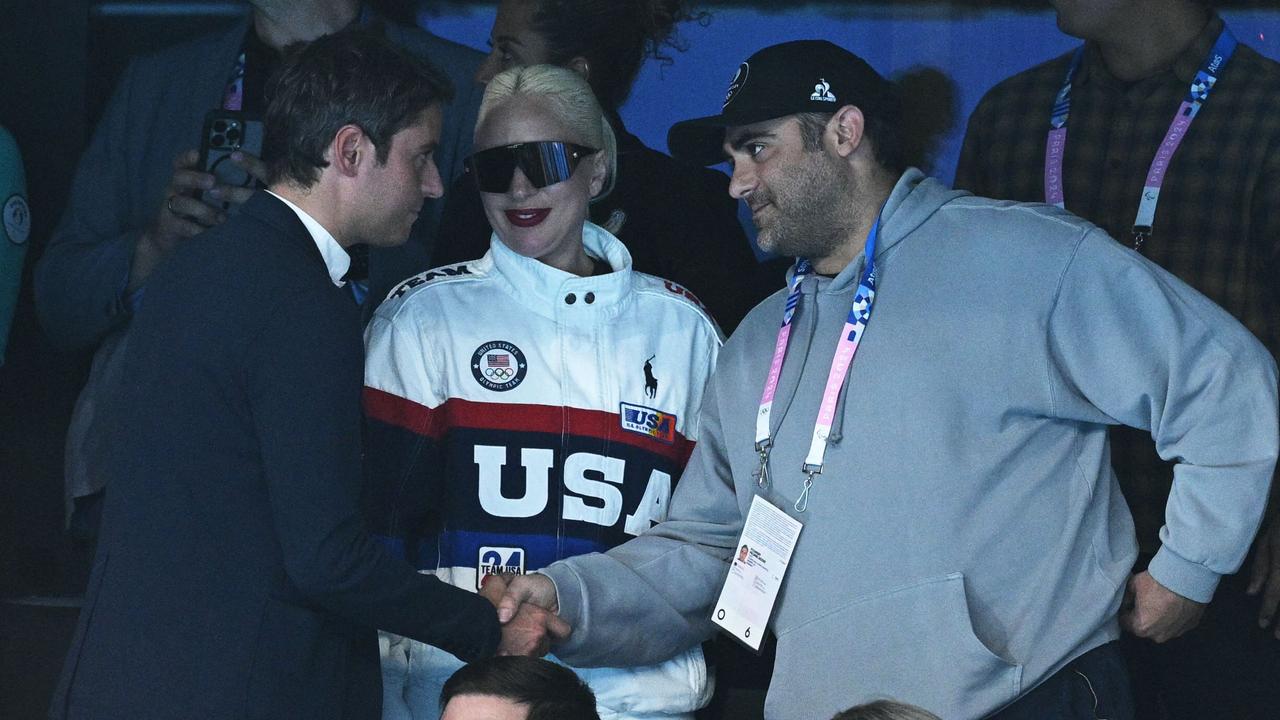 Lady Gaga introduces France's Prime Minister Gabriel Attal (left) to her ‘fiance’ Michael Polansky. Picture: Oli Scarff/AFP