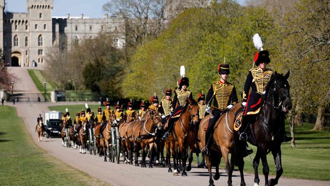 Members of the King’s Troop Royal Horse Artillery ride up the Long Walk away from Windsor Castle after the funeral Picture: AFP.