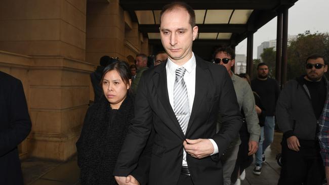 Alexander Campbell leaves the District Court with his wife Diana after being acquitted of causing the death by dangerous driving of Sophia Naismith in his Lamborghini. Picture: Tricia Watkinson