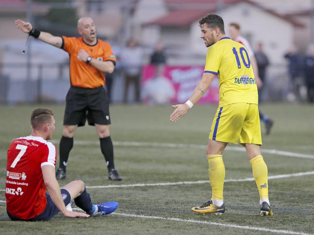 Lokoseljac Cup Final at KGV. Devonport Strikers versus South Hobart. South Hobart's Nicholas Morton is awarded a free kick against Devonport's Joel Stone. Picture: PATRICK GEE