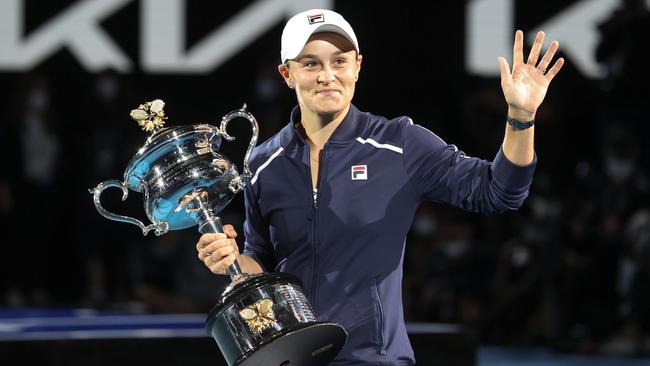 Ash Barty waves to the crowd after winning the Australian Open this year. Picture: David Caird