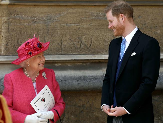 Queen Elizabeth II speaks with Prince Harry, Duke of Sussex. One of Harry’s books will only be published after Her Majesty’s death. Picture: WPA Pool/Getty Images