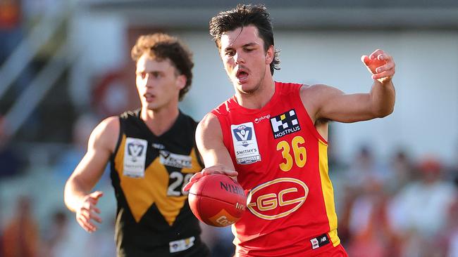 MELBOURNE, AUSTRALIA – SEPTEMBER 24: Elijah Hollands of the Suns kicks the ball during the VFL Grand Final match between Gold Coast Suns and Werribee at Ikon Park on September 24, 2023 in Melbourne, Australia. (Photo by Kelly Defina/AFL Photos/via Getty Images)