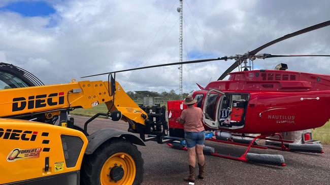 All hands on deck to load up as Nautilus Aviation Emergency Service Co-ordinator Tim Borresen said the company had four aircraft, four pilots and an air crewmen temporarily based in the Gulf to fly in urgent supplies to flooded stations and communities. Picture: Supplied