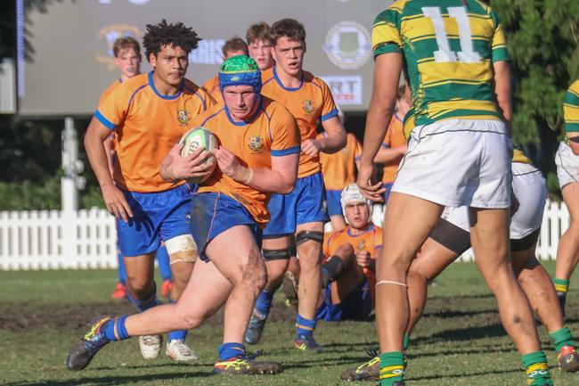 Archie Searle runs the ball. Picture: Stephen Archer