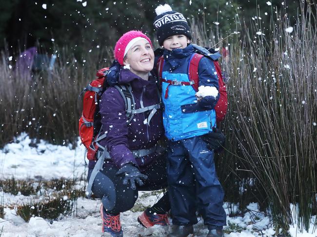 Kelly Jarvis with son Max Jarvis 6 who walked up to the Chalet from the Springs. Picture: Nikki Davis-Jones