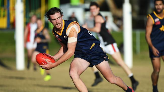 Tom Wallis has helped lift Essendon Doutta Stars off the bottom of the ladder.