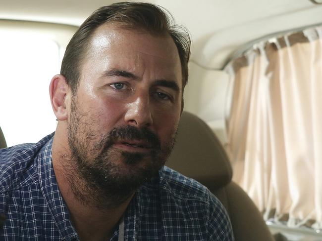 Ben Williamson waits inside a vehicle for the release of Australian Sally Faulkner and Australian reporter Tara Brown from Lebanon’s Baabda Prison for women, Lebanon April 20, 2016. Picture: REUTERS/Mohamed Azakir