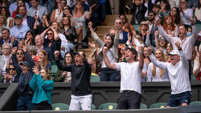 Storm Sanders, Garry Kissick and Barty’s coach Craig Tyzzer celebrate match point. Picture: Getty