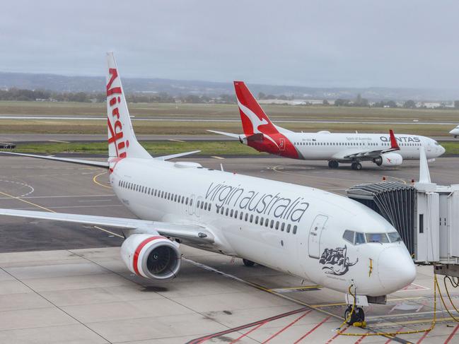 ADELAIDE, AUSTRALIA - NewsWire Photos SEPTEMBER 22, 2021: Virgin, Qantas and Cobham aircraft at Adelaide Airport. Picture: NCA NewsWire /Brenton Edwards