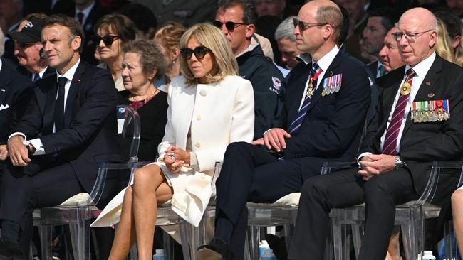 Emmanuel Macron (L) and his wife Brigitte Macron, Prince William and Australia's Governor-General David Hurley. Picture: AFP