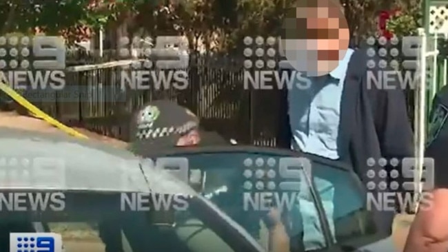 A man was arrested after a woman was stabbed and forced into a car at Sefton Plaza car park. Picture: 9News