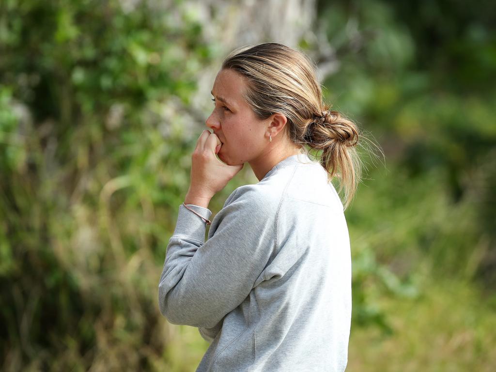 Rachel Mackenzie, girlfriend missing surf skier Jordan Kelly, listening to police during the search off North Stradbroke Island. Picture: Liam Kidston