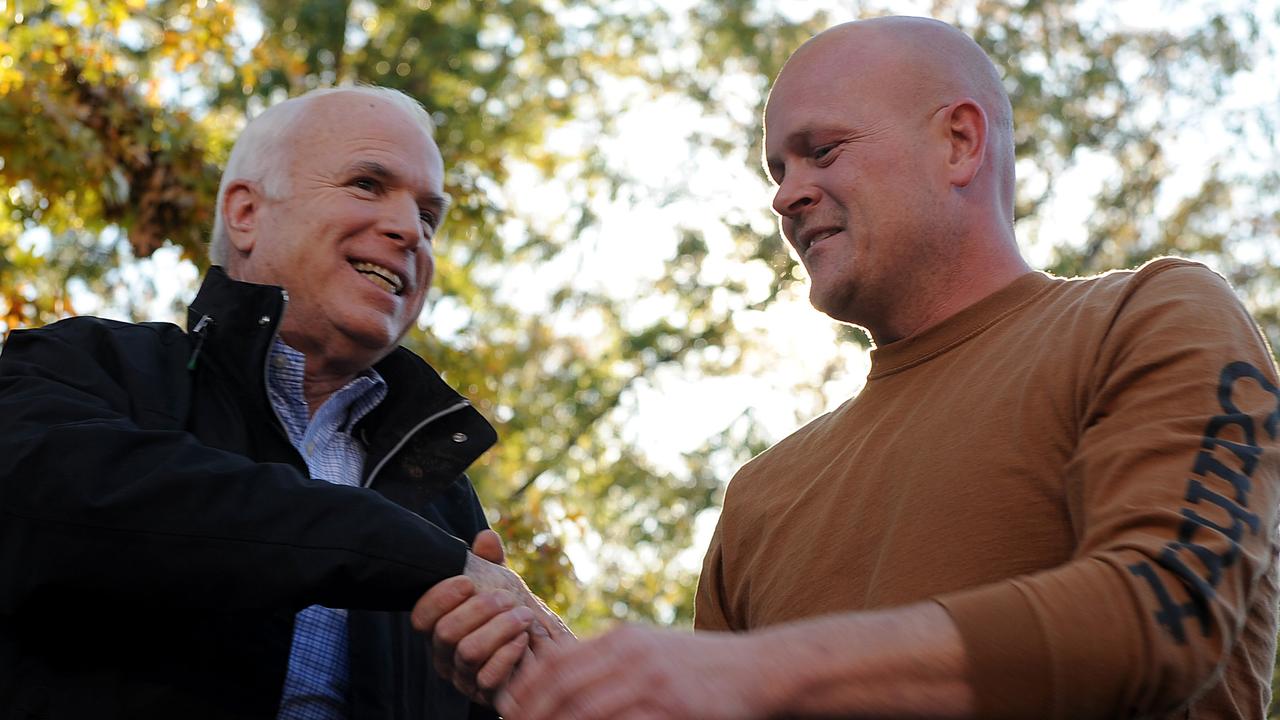 Mr Wurzelbacher with Republican presidential candidate John McCain in 2008. Picture: AFP/Robyn Beck