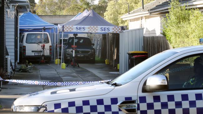 The units on Berry Avenue remain cordoned off as police investigate. Picture: David Crosling