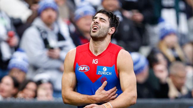 MELBOURNE, AUSTRALIA - JUNE 10: Christian Petracca of the Demons leaves the field injured during the 2024 AFL Round 13 match between the Collingwood Magpies and the Melbourne Demons at The Melbourne Cricket Ground on June 10, 2024 in Melbourne, Australia. (Photo by Dylan Burns/AFL Photos)