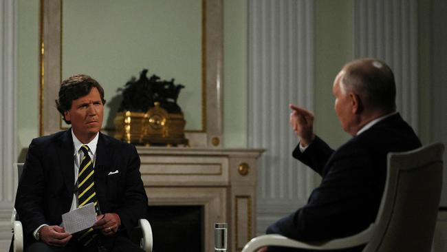 Vladimir Putin gives an interview to US talk show host Tucker Carlson at the Kremlin in Moscow.