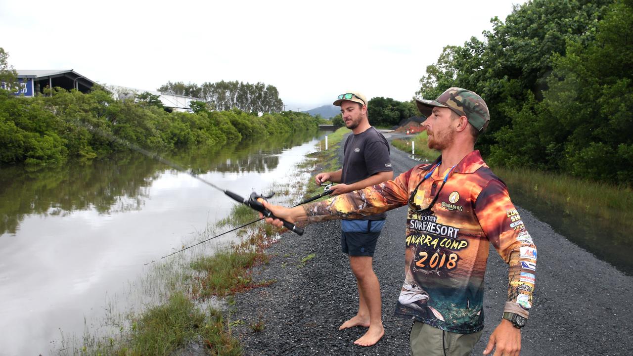 David Moran and Cody Larkin fishing in the Fearnely St channel during the high tide PICTURE: ANNA ROGERS