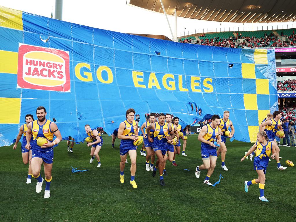 SYDNEY, AUSTRALIA - JUNE 24:  The Eagles run through their banner during the round 15 AFL match between Sydney Swans and West Coast Eagles at Sydney Cricket Ground, on June 24, 2023, in Sydney, Australia. (Photo by Matt King/AFL Photos/via Getty Images )
