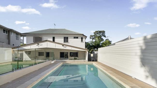 This house at 20 Meemar St, Chermside, sold at auction for $100,000 over the reserve.