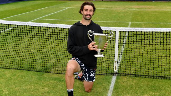 SURBITON, ENGLAND - JUNE 05: Jordan Thompson of Australia poses with the trophy after winning the Men's Singles Final match against Denis Kudla of United States on Day Eight of the Surbiton Trophy at Surbiton Racket &amp; Fitness Club on June 05, 2022 in Surbiton, England. (Photo by Tom Dulat/Getty Images for LTA)