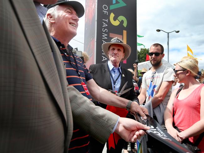 Aldermen Damon Thomas and Ron Christie cut the ribbon to officially open the Taste of Tasmania. Pictures: Nikki Davis-Jones