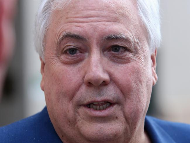 Clive Palmer talks to the media before leaving the Federal law courts in Brisbane, Monday, December 11, 2017. Clive Palmer has taken the stand in the Brisbane Federal Court over the collapse of Queensland Nickel. (AAP Image/Jono Searle) NO ARCHIVING