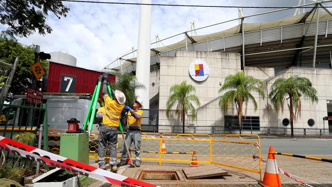 Energex workers at the Gabba following the power outage. Picture David Clark