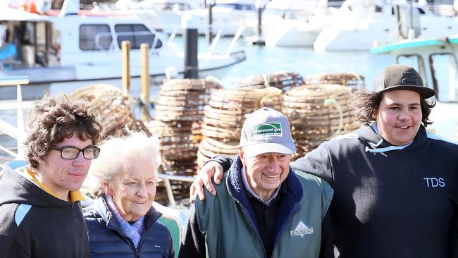 Jayden Silver, left, and Declan Darper, right, with Ann and Jim McCreary after they helped rescue the 85-year-old man from his submerged car. Picture: SAM ROSEWARNE