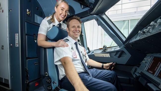 Love is in the air with Jetstar pilots Matthew Wills and Rachel Blair-Wills. Picture Mark Brake